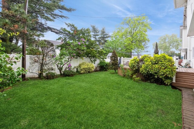 view of yard featuring a deck