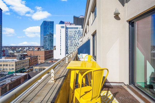 balcony featuring a view of city