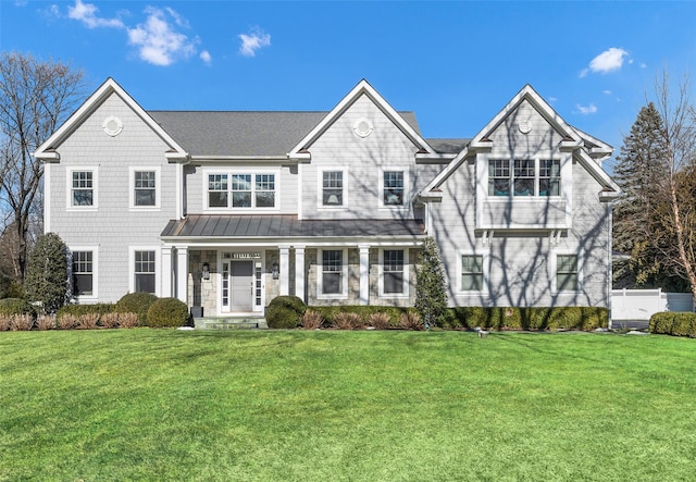 view of front of home with a front yard