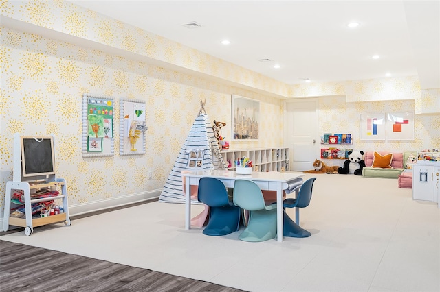 playroom featuring hardwood / wood-style flooring