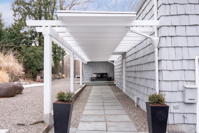 view of patio featuring a carport