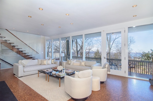 living room with recessed lighting and stairs