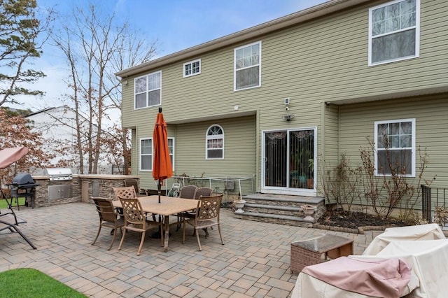 view of patio with exterior kitchen