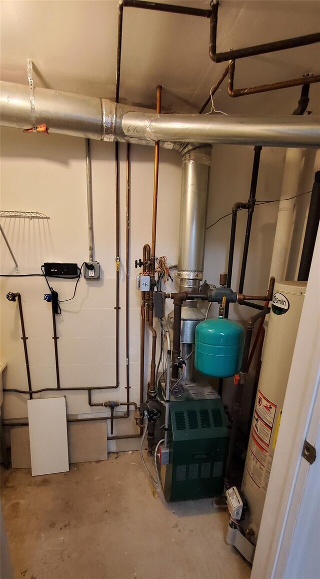 utility room with water heater