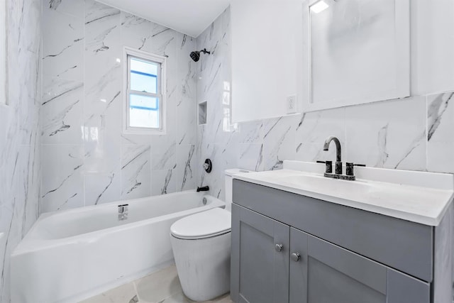 full bathroom with tiled shower / bath, tile walls, vanity, and toilet