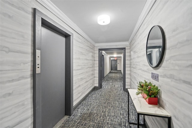 hallway with dark carpet, crown molding, and elevator