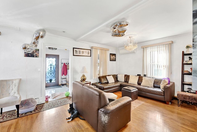 living room featuring crown molding and light hardwood / wood-style flooring