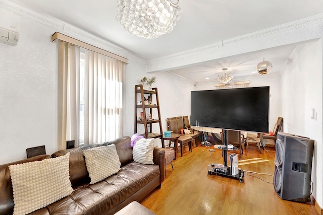 living room featuring crown molding, a notable chandelier, and hardwood / wood-style flooring