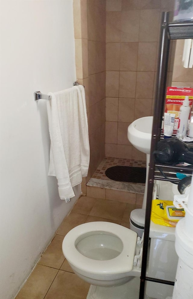 102-17 62nd Dr, Forest Hills, NY 11375 - bathroom featuring toilet, a stall shower, and tile patterned floors