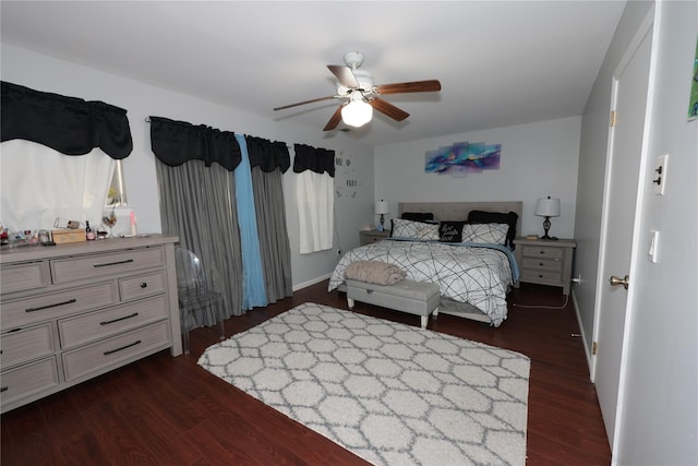 bedroom featuring dark hardwood / wood-style flooring and ceiling fan