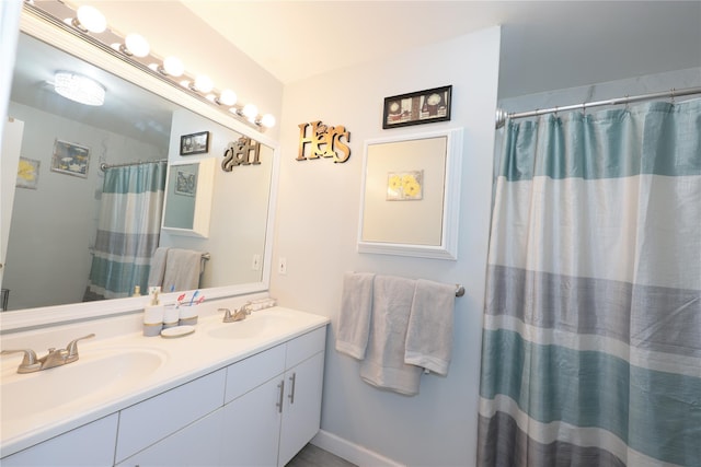 bathroom featuring vanity and walk in shower