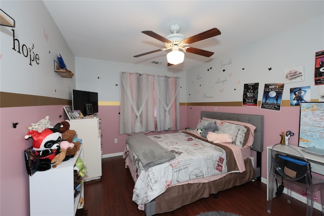 bedroom featuring ceiling fan and dark hardwood / wood-style floors