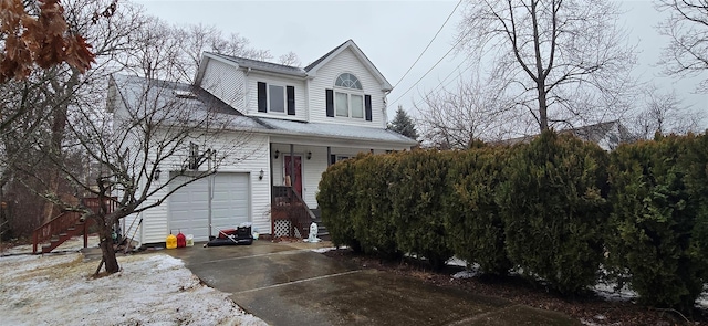 view of front of property featuring a garage