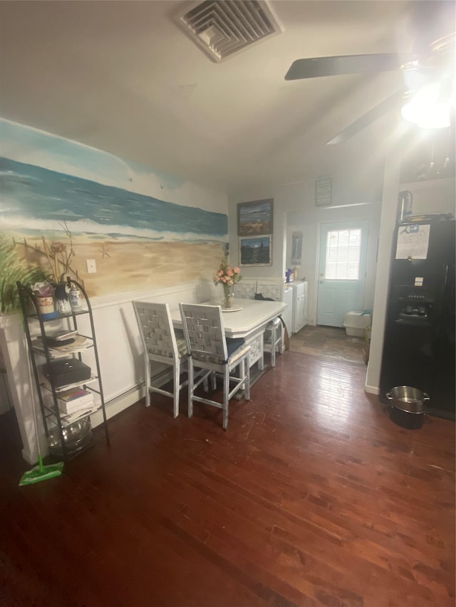 unfurnished dining area featuring dark hardwood / wood-style flooring and ceiling fan