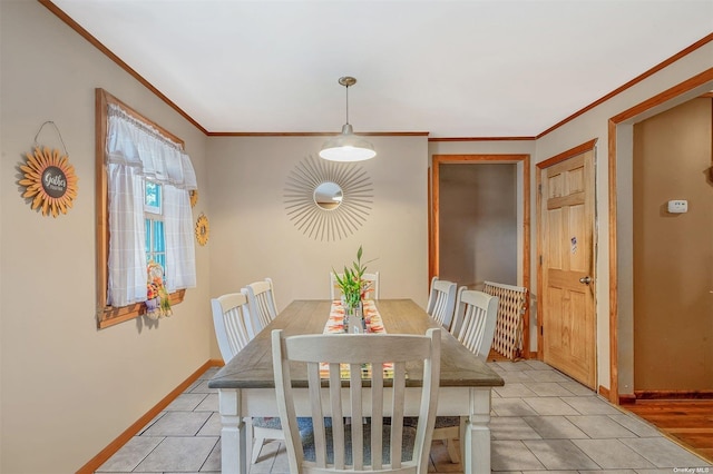 tiled dining area with ornamental molding