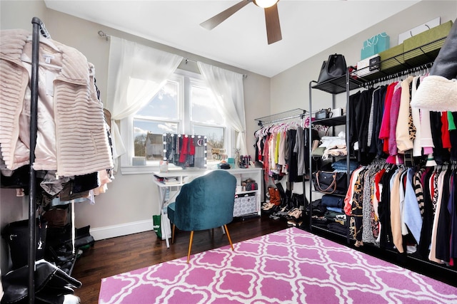 spacious closet featuring dark wood-type flooring and ceiling fan