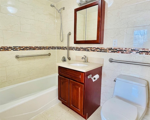 full bathroom featuring tile walls, vanity, tiled shower / bath combo, and toilet