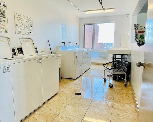 laundry area featuring washing machine and dryer