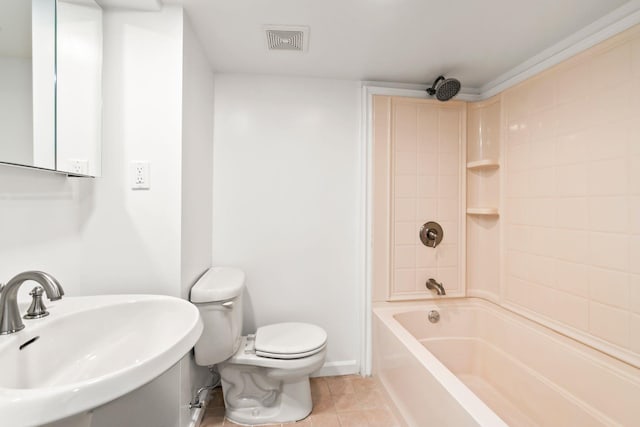 full bathroom with sink, tile patterned floors, shower / bathtub combination, and toilet