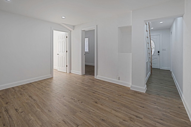 empty room featuring dark hardwood / wood-style floors