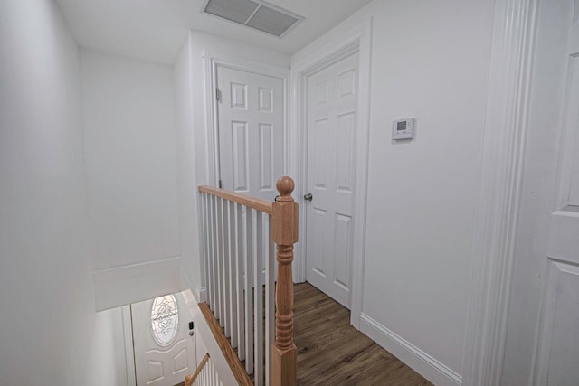 hallway featuring dark hardwood / wood-style floors