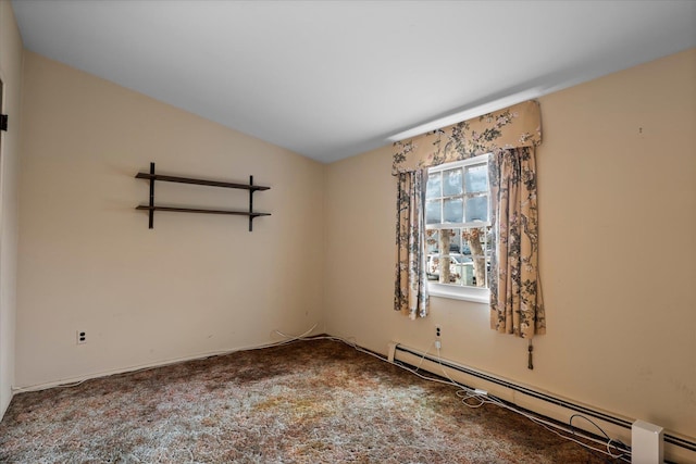 unfurnished room with carpet and baseboard heating