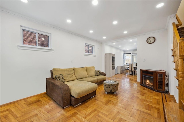 living room featuring crown molding and light parquet flooring