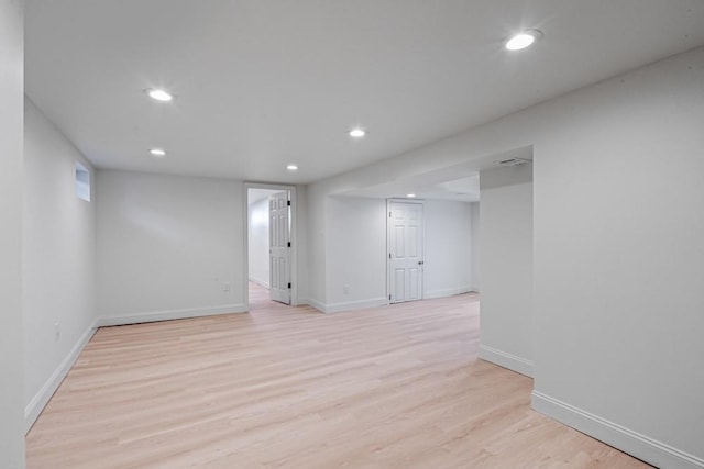 empty room with light wood-type flooring