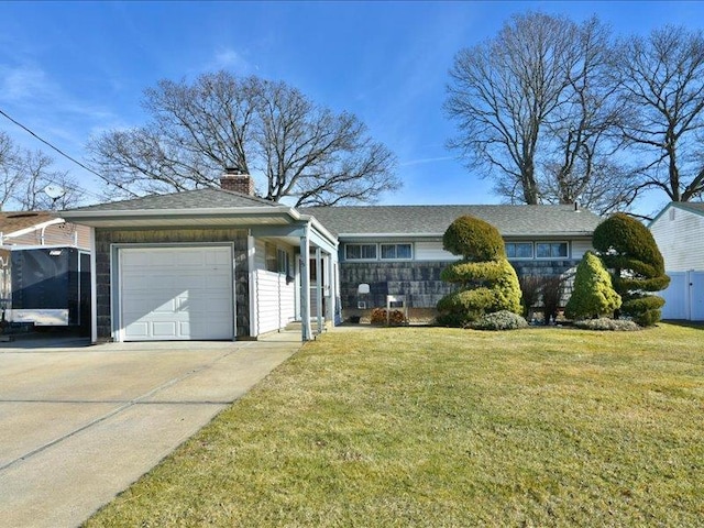 ranch-style home with a garage and a front yard