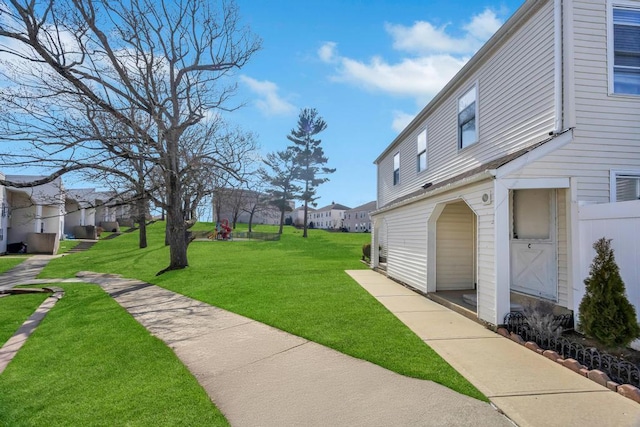 view of yard featuring a residential view