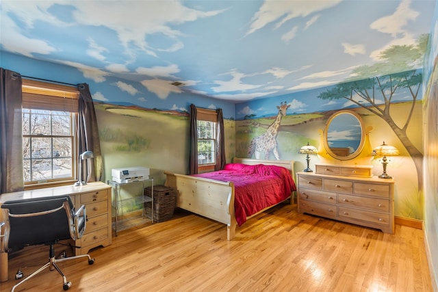 bedroom with light wood-style flooring