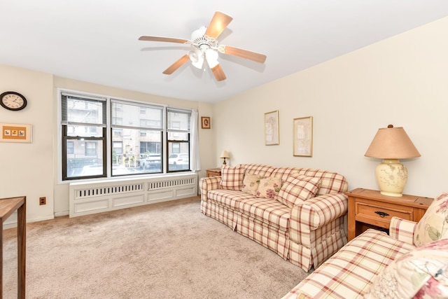 living room with ceiling fan and light carpet