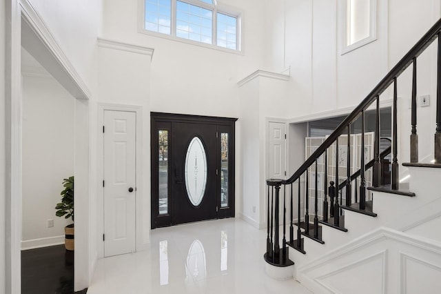 foyer with a high ceiling