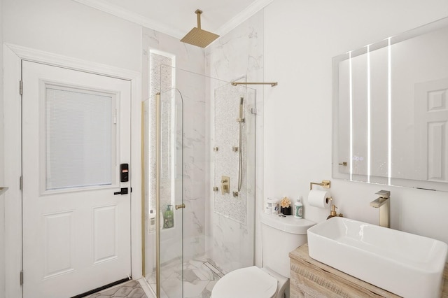 bathroom featuring sink, ornamental molding, and a shower with door