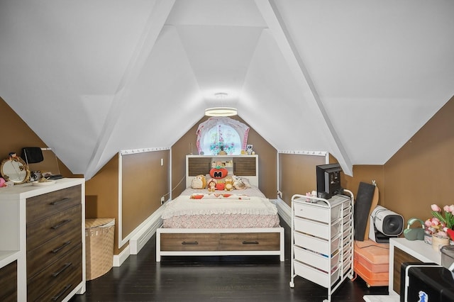 bedroom featuring dark wood-type flooring and vaulted ceiling