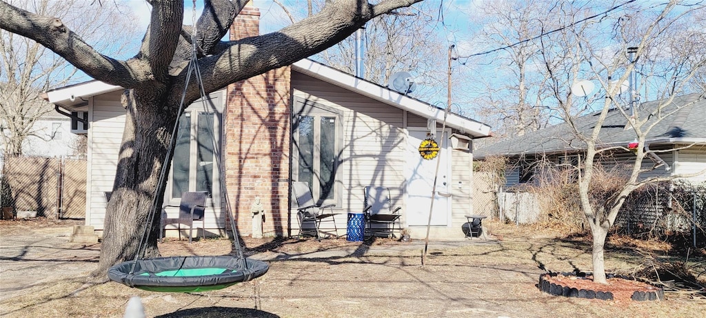 view of property exterior featuring a trampoline