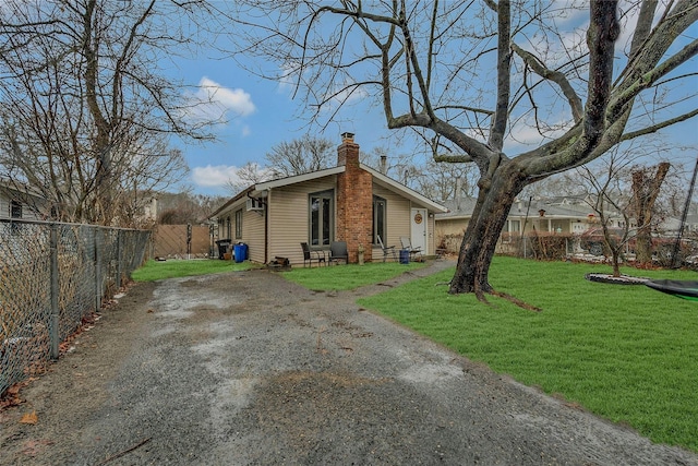 view of property exterior featuring a yard