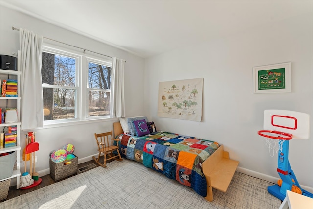 bedroom featuring visible vents and baseboards