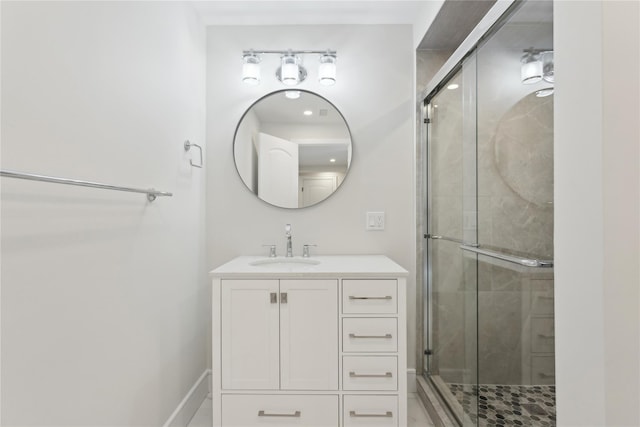 bathroom with vanity and walk in shower