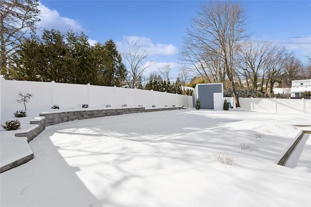 view of yard covered in snow