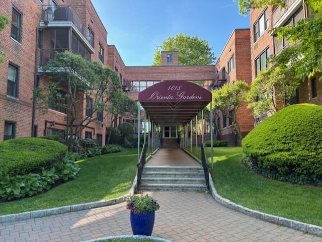 1015 Old Post Rd Unit Mm, Mamaroneck, NY 10543 - view of home's community featuring a lawn