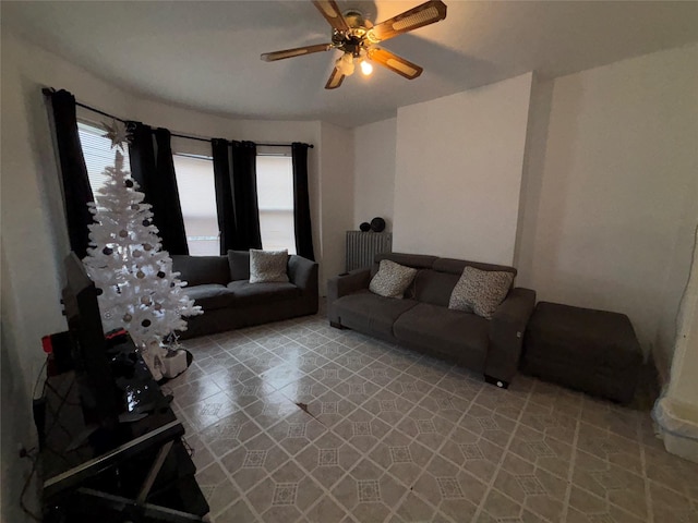 living room featuring ceiling fan