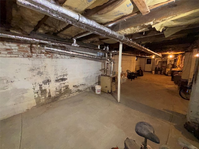 basement featuring water heater