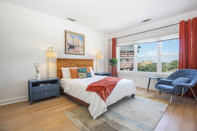 bedroom with light wood-type flooring