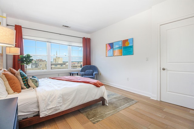 bedroom featuring light wood-type flooring