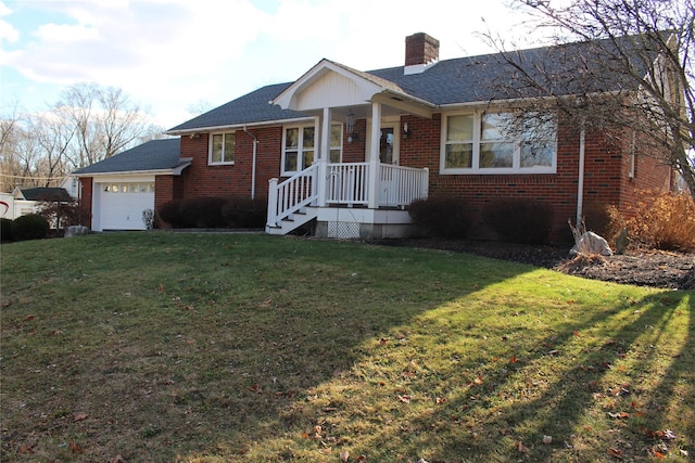 ranch-style house featuring a garage and a front lawn