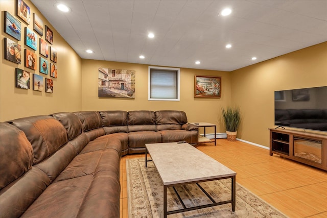 living room with a baseboard radiator and tile patterned floors