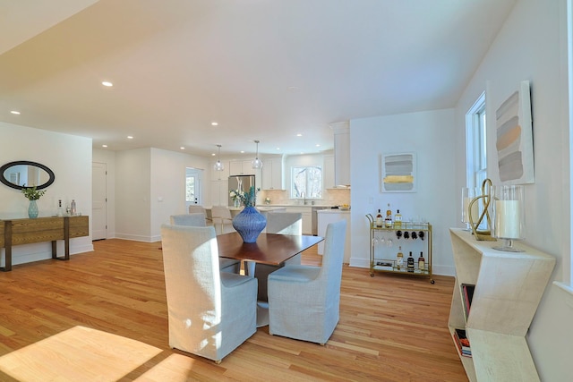 dining room featuring light hardwood / wood-style floors