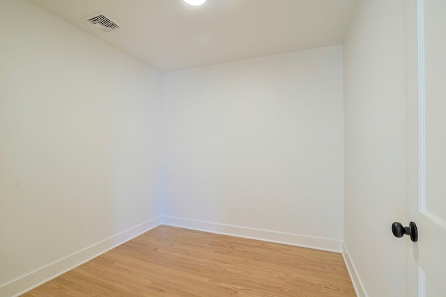 spare room featuring light wood-type flooring