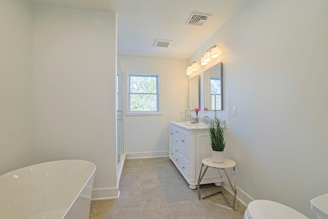 full bathroom with vanity, toilet, and shower with separate bathtub